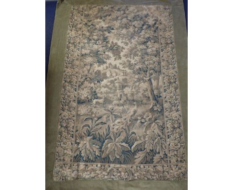 A TAPESTRY PANEL, VERDURE STYLE LANDSCAPE WITH PEACOCK AND CASTLEwith corduroy border and backing 218 x 152cm approx