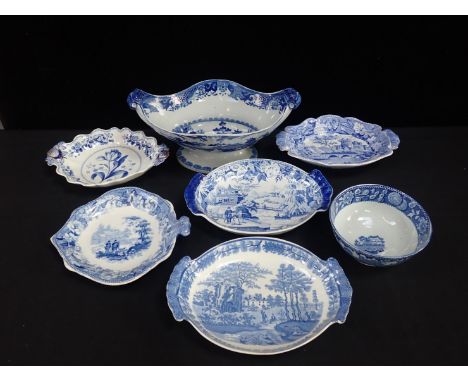 A 19th CENTURY GONDOLA SHAPED BLUE AND WHITE COMPORTwith other shaped dessert serving dishes and a basin