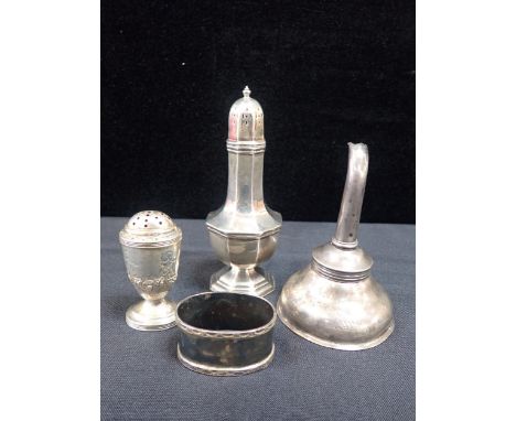 A SILVER CASTOR AND PEPPERETTEwith a George III silver wine funnel and a silver napkin ring