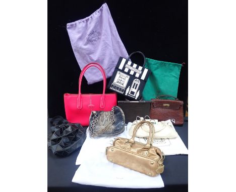 A COLLECTION OF VINTAGE BRANDED HANDBAGSincluding 'Mulberry', 'Prada', 'Ferragamo', 'Paul Smith' and others, with storage bag
