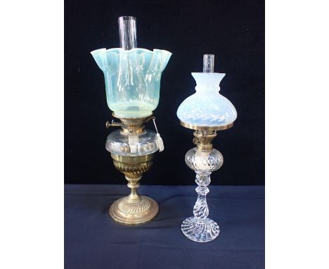 A VICTORIAN OIL LAMP WITH VASELINE GLASS SHADEbrass base and glass font (font cracked), and another oil lamp with cut glass f