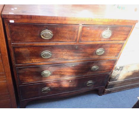 A GEORGE III MAHOGANY CHEST OF DRAWERSwith (replacement) pressed brass handles, on bracket feet  105cm wide (repairs)
