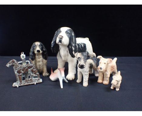 A COLLECTION OF SYLVAC AND OTHER DOGSincluding a brass terrier door knocker