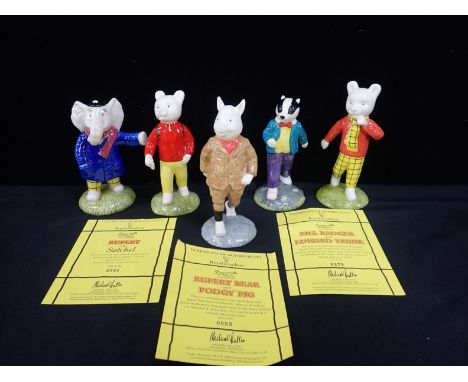 FIVE JOHN BESWICK RUPERT BEAR FIGUREScomprising Rupert Bear, no 883, Edward Trunk, no 279, Bill Badger, no 279, Rupert with S