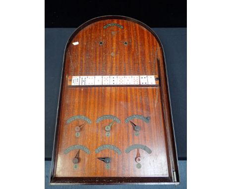 A 20th CENTURY 'PIN PONTOON' BAGATELLE GAMEmahogany, with Bakelite markers (firing pin a/f)