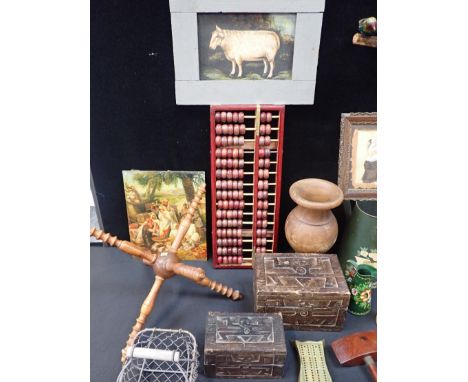 A WOODEN FRAMED ABACUS AND ITEMS OF WOODWORK AND METALWORKincluding three carved boxes, a gavel, a yarn winder 'cat', a pair 