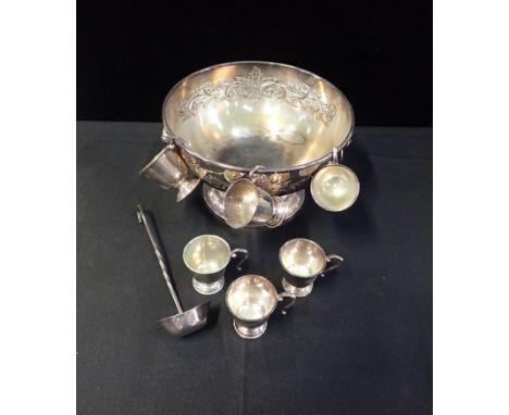 A SILVER PLATED PUNCH BOWL, LADLE AND CUPSmeasuring 31.5cm in diameter, with six cups (some marked 'Mappins Ltd') and a ladle