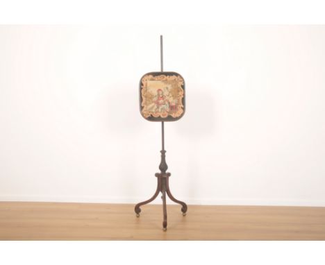 A REGENCY GRAINED WOOD AND GILT METAL MOUNTED POLE SCREENearly 19th century, with an embroidered tapestry panel on a wrythen 