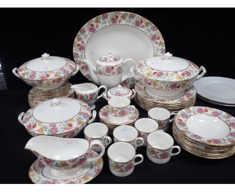 A ROYAL WORCESTER 'CHINESE GARDEN' PART DINNER SERVICEseven settings, with coffee pot, three covered dishes, etc, and two 'We