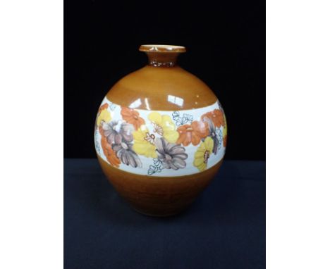 A POOLE POTTERY: A LARGE VASE PAINTED BU JULIE WILLSwith a band of stylised flowers 29cm high