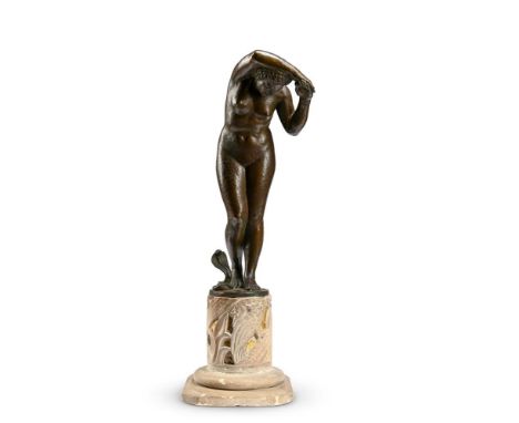 A BRONZE FIGURE OF A NUDE WOMAN WITH A COBRA  EARLY 20TH CENTURY  Set on gilt glass inset carved stone base, signed to cast i