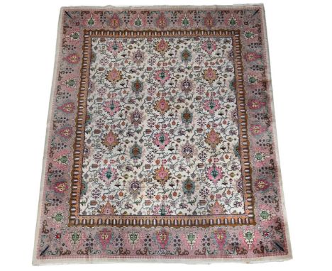A TABRIZ CARPET  SIGNED BY MASTER WEAVER JAVAN AMIR KHIZ, CIRCA 1920 approximately 377 x 314cm  Condition Report:  Carpet wit