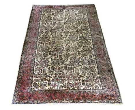 A KASHAN CARPET approximately 600 x 303cm  Condition Report:  Carpet with wear and fading commensurate with age and use. Vari