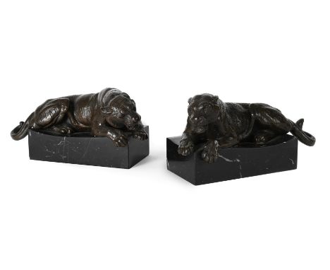 A PAIR OF ANIMALIER BRONZES OF PANTHERS  20TH CENTURY  Set on black marble bases  10cm high, 21cm wide overall   Condition Re