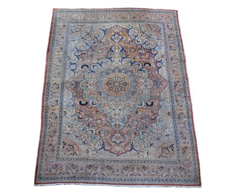 A TABRIZ HAJIJALILI CARPET  CIRCA 1890  approximately 553 x 396cm  Condition Report:  Carpet with wear overall commensurate w