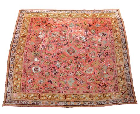 A LARGE DONEGAL CARPET approximately 405 x 405cm  Condition Report:  Capet with wear overall consistent with age and use.  Va