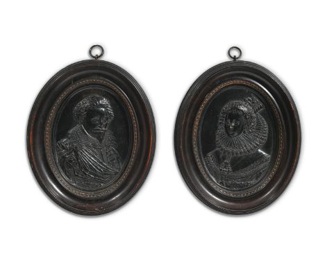 A RARE PAIR OF PRESSED HORN RELIEF PORTRAITS BY JOHN OSBORN (1581/4-1634)   DATED 1626  Depicting Henry, Prince of Orange, an