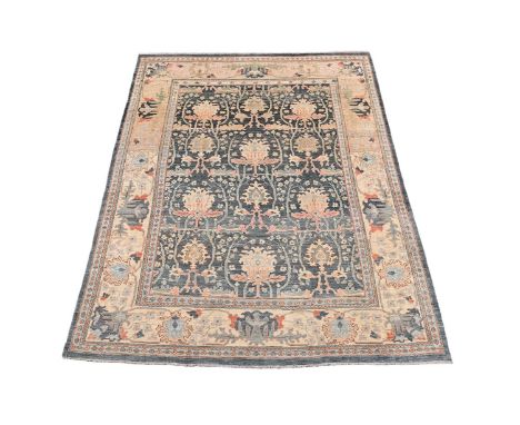 A LARGE WOVEN CARPET IN ARTS & CRAFTS STYLE approximately 497 x 359cm   Condition Report:  Carpet in good presentable order o