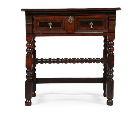 A JAMES II OAK SIDE TABLE CIRCA 1685 73cm high, 73.5cm wide, 55.5cm deep    Condition Report:  Marks, knocks, scratches and a