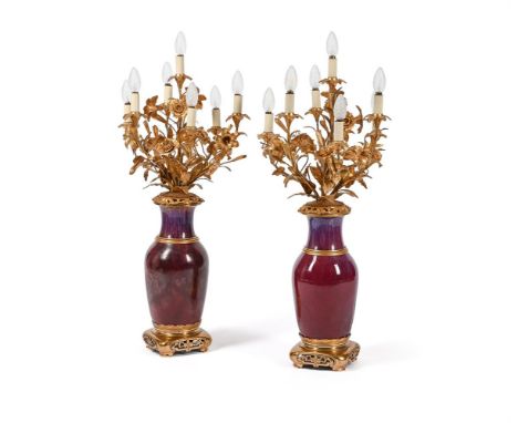 A LARGE PAIR OF FRENCH ORMOLU MOUNTED CHINESE FLAMBÉ GLAZE SEVEN LIGHT VASE CANDELABRA CIRCA 1890  Each baluster vase with da