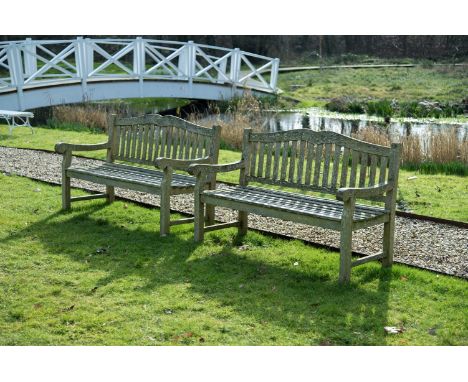 A PAIR OF HARDWOOD GARDEN BENCHES BY SLOANE & SONS, CONTEMPORARY each 95cm high, 150cm wide, 66cm deep overall  Condition Rep