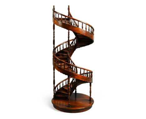A LARGE SCALE MODEL OF A SPIRAL STAIRCASE  20TH CENTURY 105.5cm high 