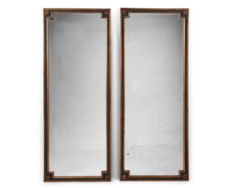 A LARGE PAIR OF GILTWOOD AND PAINTED GESSO MIRRORS LATE 19TH OR EARLY 20TH CENTURY With leaf and dart moulding around the bev