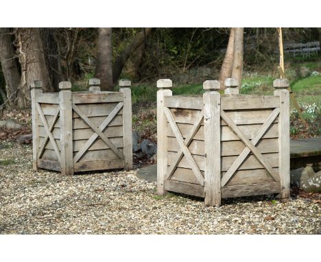 A PAIR OF LARGE OAK BOX PLANTERS  CONTEMPORARY  Of 'Versailles' type each 105cm high, 85cm wide, 85cm deep overall  Condition