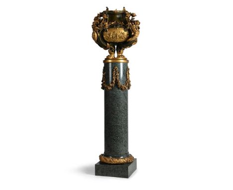 A LARGE IMPRESSIVE BRONZE AND ORMOLU JARDINIÈRE ON A MARBLE PEDESTAL  FRENCH, LATE 19TH CENTURY  The shaped circular jardiniè