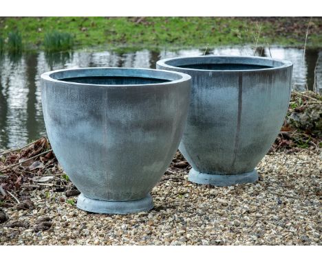 A LARGE PAIR OF VERDIGRIS COPPER PLANTERS CONTEMPORARY Each with rollover edge, tapering cylindrical body, pierced for draina