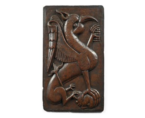 A CARVED OAK PANEL DEPICTING A GRIFFIN  17TH CENTURY  48 x 27cm   Provenance:  Works of Art from the collection of the late R