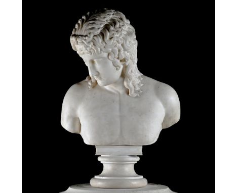AFTER THE ANTIQUE, A LARGE GRAND TOUR MARBLE BUST OF THE EROS OF CENTOCELLE  ITALIAN, 19TH CENTURY  White marble, socle base 