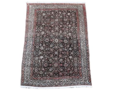 A BIDJAR CARPET CIRCA 1910 approximately 321 x 225cm  Condition Report:  Carpet with some wear overall consistent with age an