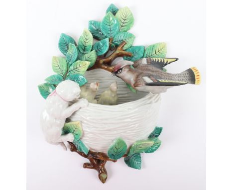 A 19th century Dresden Porcelain pottery group, circa 1870, ‘crowned R mark’, showing a crested bird on nest with chicks with