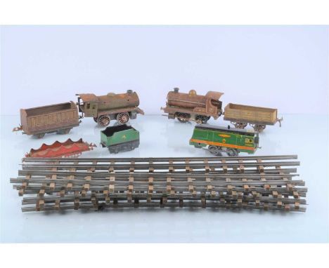 A random selection of 0 Gauge clockwork Trains and Track, including Hornby early LMS crimson No. 1 loco only (broken spring),