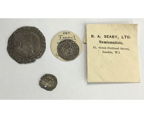 James I, Shilling mm Escallop, Halfgroat mm Rose (with original sale ticket) and a penny (holed).