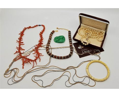 A collection of costume jewellery, to include: a Christian Dior two tone four strand necklace, signed to clasp, together with