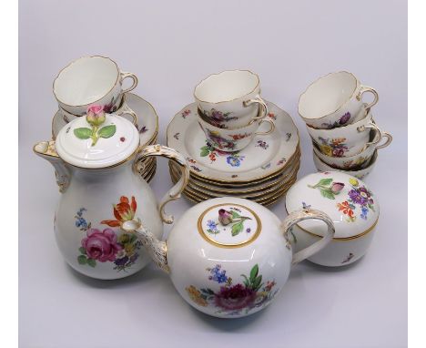 A part Meissen Porcelain tea service with hand painted floral scenesCondition  to teapot , chocolate pot good, one cup at fau