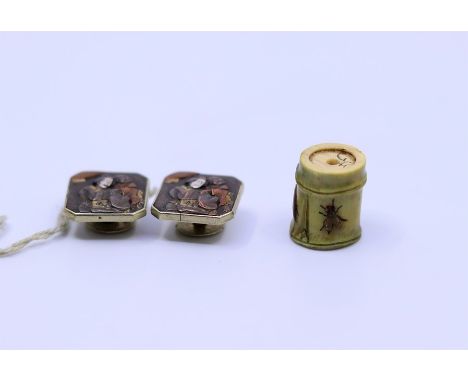 A pair of Japanese Meiji period buttons and a Japanese toggle Netsuke inlaid with insects signed&nbsp;