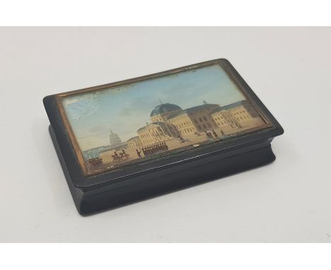 An early 19th century continental gilt metal mounted tortoiseshell snuff box, the lid painted with a scene of cathedral in th