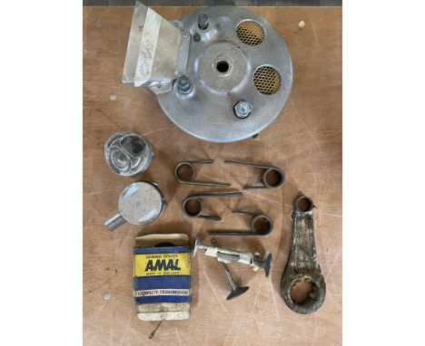 A quantity of engine parts for a Manx Norton and a brake plate for a BSA Gold Star, plus brake shoes.