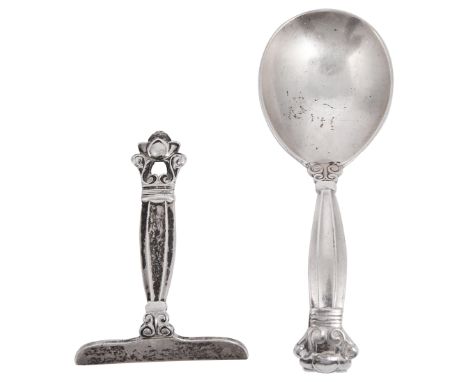 A DANISH SILVER CHILD"S (OR CADDY) SPOON AND A CHILD"S PUSHER, GEORG JENSEN, COPENHAGEN, CIRCA 1930 AND 1954 RESPECTIVELY Aco