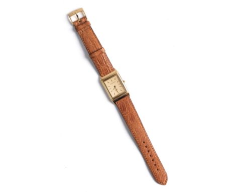 JAEGER LECOULTRE, REVERSO CLASSIC: A GOLD WRISTWATCH, SWISS, 1980s quartz movement, signed champagne dial with applied hour b