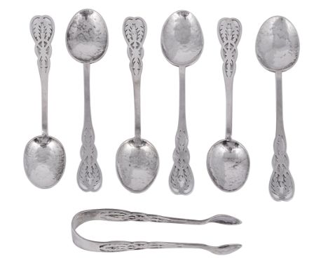 A SET OF SIX GEORGE V SILVER TEASPOONS AND THEIR SUGAR TONGS, SIBYL DUNLOP, LONDON, 1923 hammer finished, with shaped termina