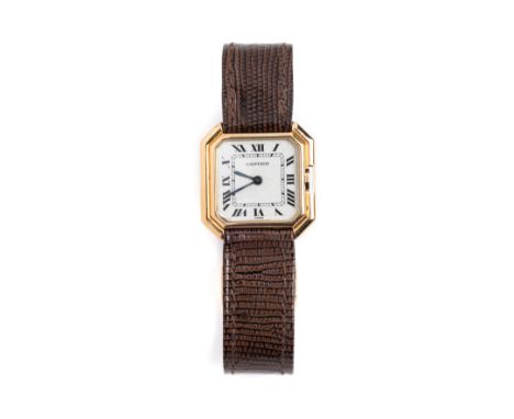 CARTIER, CEINTURE: A GOLD WRISTWATCH, 1970s manual wind movement, the white enamel (crazed) dial with Roman numerals signed "