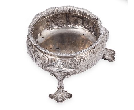 A GEORGE III SILVER SALT CELLAR, ROBERT HENNELL, LONDON, 1814 cauldron form, chased with buildings, foliage and a vacant cart