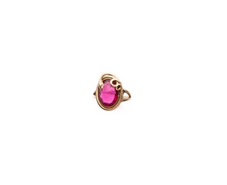 [GP] GOLD AND PASTE SERPENT RING, LATE 19TH CENTURY the oval cabochon deep pink paste within an entwined serpent surround sha