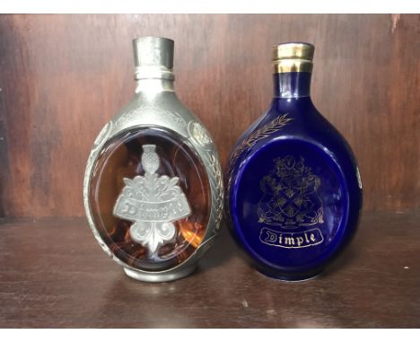 DIMPLE ROYAL DECANTER Blended Scotch Whisky 75cl, 40% volume. DIMPLE BLUE DECANTER Blended Scotch Whisky 75cl, 43% volume. Tw