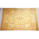 AN AUBUSSON TAPESTRY IN 18TH CENTURY STYLE, cream ground with floral sprays within classical panels.