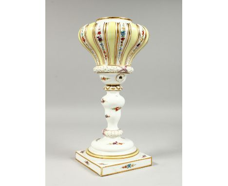 A MEISSEN PORCELAIN LAMP BASE painted and sprigged with flowers on a square base. Cross swords mark in blue 14ins high.